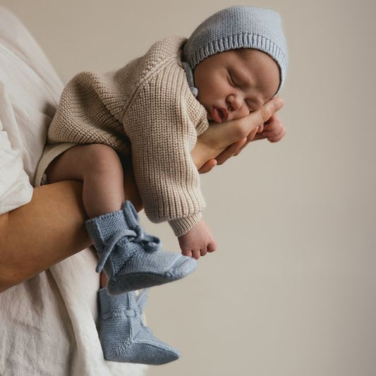 Hvid slofjes van merinowol light blue baby