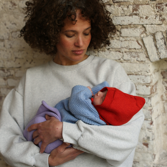 Hvid vest inga light blue baby met moeder