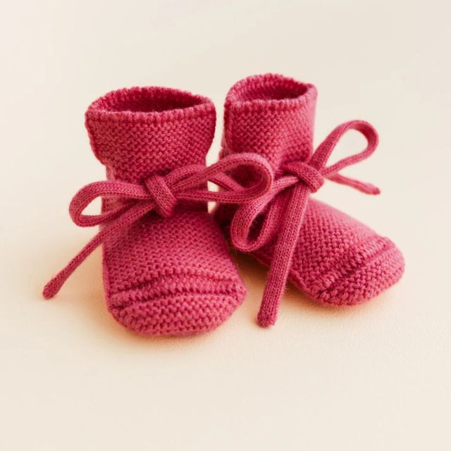 Hvid slofjes van merinowol lollipop roze