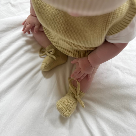 Hvid slofjes van merinowol light yellow