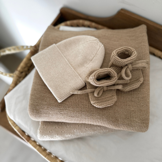 Hvid slofjes van merinowol sand