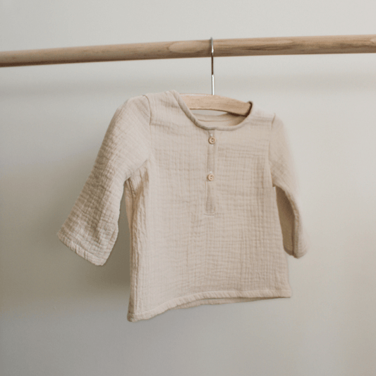Two thirteen mousseline blouse buttons-up