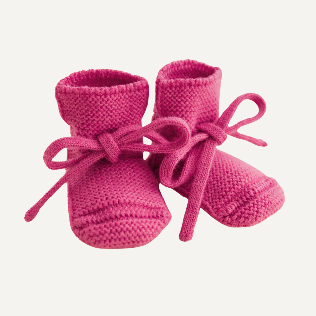Hvid slofjes van merinowol fuchsia