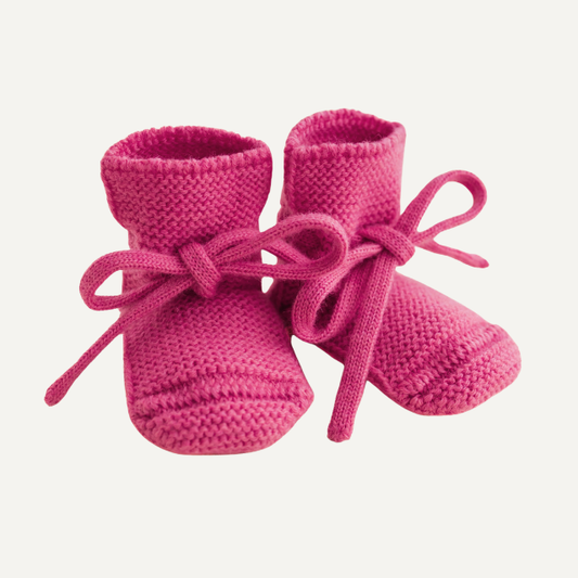 Hvid slofjes van merinowol fuchsia