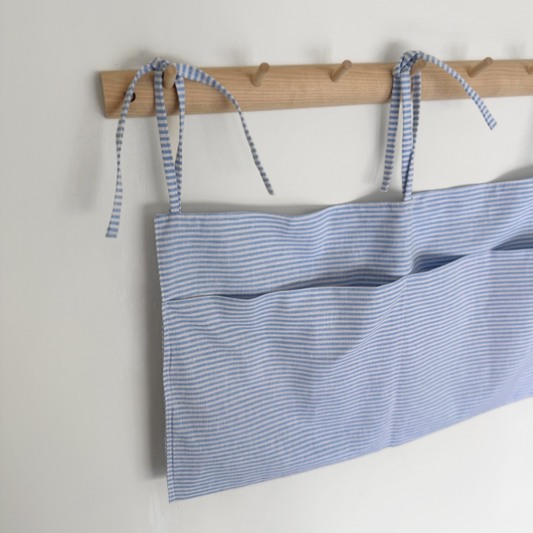 lichtblauw gestreept linnen bed box organizer babykamer
