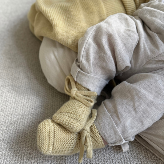 Hvid slippers made of merino wool light yellow