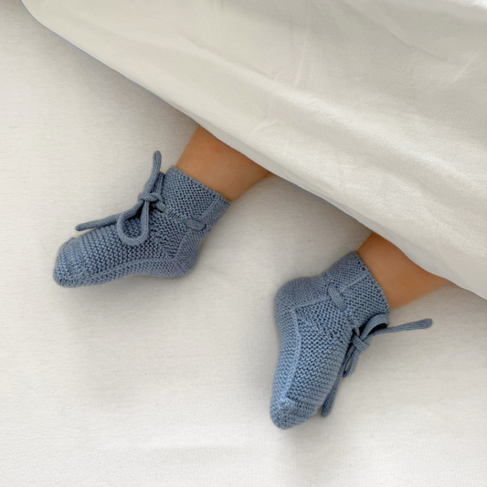 wollen slofjes hvid lichtblauw merinowol baby newborn
