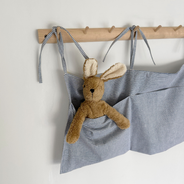 Beige linen bed and box organizer