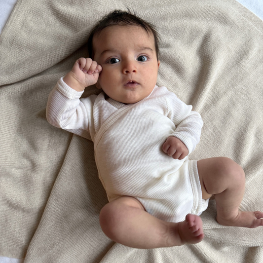 witte wollen romper baby newborn kico label